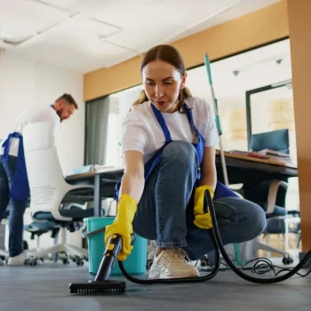 professional-cleaning-service-person-using-vacuum-cleaner-office-1
